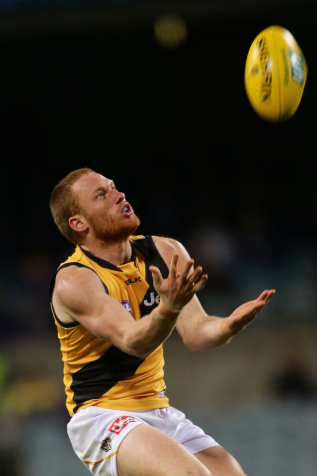 AFL 2016 Rd 09 - Fremantle v Richmond PERTH, AUSTRALIA - MAY 21: Nick Vlastuin of the Tigers marks the ball during the 2016 AFL Round 09 match between the Fremantle Dockers and the Richmond Tigers at Domain Stadium on May 21, 2016 in Perth, Australia. (Photo by Will Russell/AFL Media)